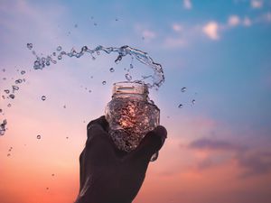 Preview wallpaper hand, jar, spray, drops, water, spill