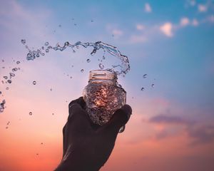 Preview wallpaper hand, jar, spray, drops, water, spill