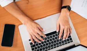 Preview wallpaper hand, laptop, work