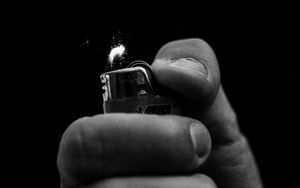 Preview wallpaper hand, lighter, bw, sparks