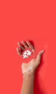 Preview wallpaper hand, liquid, flowers, red