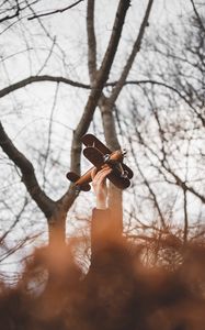 Preview wallpaper hand, plane, toy, trees, branches