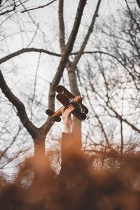 Preview wallpaper hand, plane, toy, trees, branches