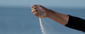 Preview wallpaper hand, sand, sea, wind