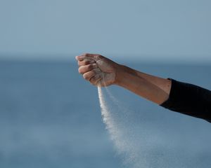 Preview wallpaper hand, sand, sea, wind