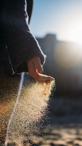 Preview wallpaper hand, sand, sunlight, glare