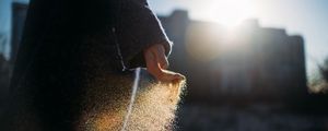 Preview wallpaper hand, sand, sunlight, glare