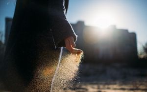 Preview wallpaper hand, sand, sunlight, glare