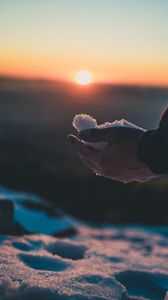 Preview wallpaper hand, snow, sunset, twilight, nature