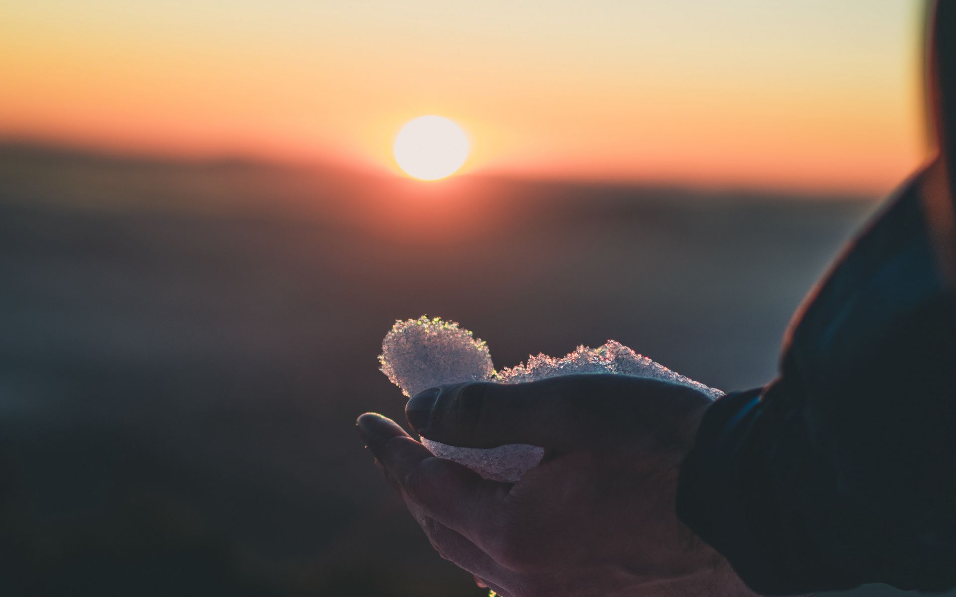 Download Wallpaper 1920x1200 Hand, Snow, Sunset, Twilight, Nature 