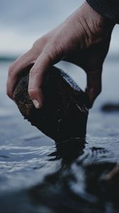 Preview wallpaper hand, stone, water, wet