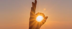 Preview wallpaper hand, sun, rays, sunset, dawn