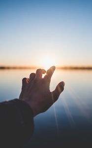 Preview wallpaper hand, sunlight, touch, rays