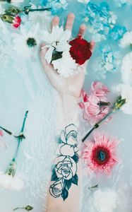 Preview wallpaper hand, tattoo, flowers, water