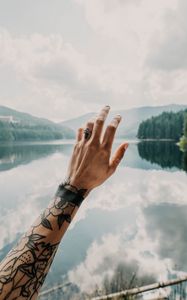 Preview wallpaper hand, tattoos, touch, lake, landscape