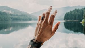 Preview wallpaper hand, tattoos, touch, lake, landscape