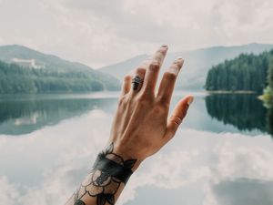 Preview wallpaper hand, tattoos, touch, lake, landscape