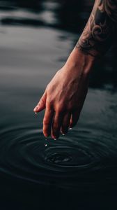 Preview wallpaper hand, water, drops, waves