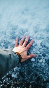 Preview wallpaper hand, water, stones, bottom