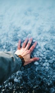Preview wallpaper hand, water, stones, bottom