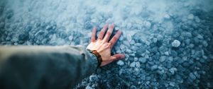 Preview wallpaper hand, water, stones, bottom