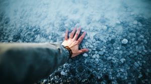 Preview wallpaper hand, water, stones, bottom