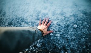 Preview wallpaper hand, water, stones, bottom