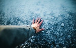 Preview wallpaper hand, water, stones, bottom