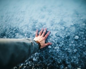 Preview wallpaper hand, water, stones, bottom