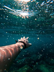 Preview wallpaper hand, water, swimming, underwater