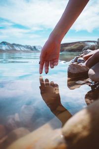 Preview wallpaper hand, water, touch, reflection