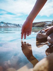 Preview wallpaper hand, water, touch, reflection