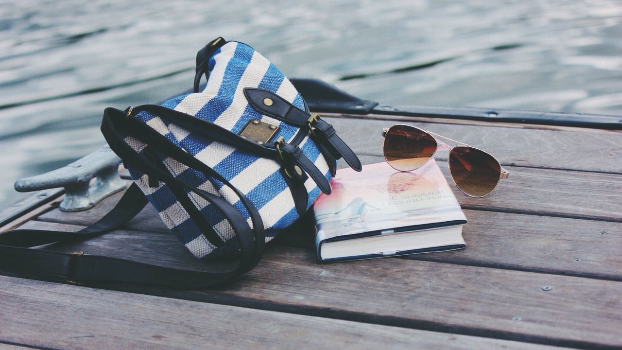 Wallpaper handbag, sunglasses, book, river