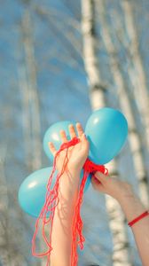 Preview wallpaper hands, balloons, trees