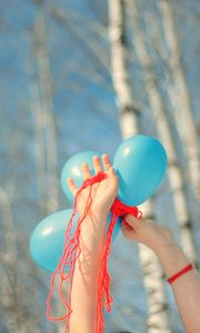 Preview wallpaper hands, balloons, trees