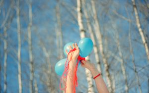 Preview wallpaper hands, balloons, trees