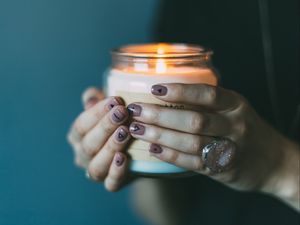 Preview wallpaper hands, candle, manicure