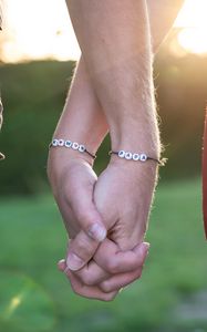 Preview wallpaper hands, fingers, touch, bracelets, couple