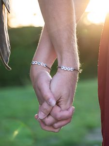 Preview wallpaper hands, fingers, touch, bracelets, couple