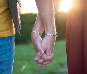 Preview wallpaper hands, fingers, touch, bracelets, couple