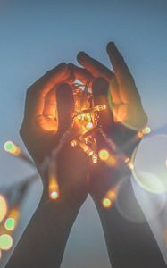 Preview wallpaper hands, garlands, glare, lights, holiday