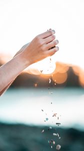 Preview wallpaper hands, pebbles, stones, movement, macro