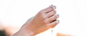 Preview wallpaper hands, pebbles, stones, movement, macro