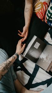 Preview wallpaper hands, tattoo, book