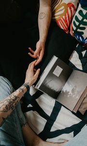 Preview wallpaper hands, tattoo, book