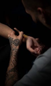 Preview wallpaper hands, tattoo, tattoo artist, process, drawing, tattooer, tattooist