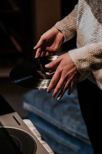 Preview wallpaper hands, vinyl plate, sweater