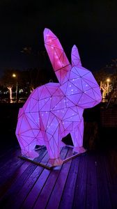 Preview wallpaper hare, figure, statue, light, purple, dark