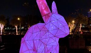 Preview wallpaper hare, figure, statue, light, purple, dark