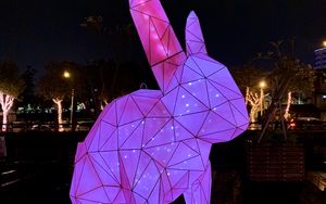 Preview wallpaper hare, figure, statue, light, purple, dark